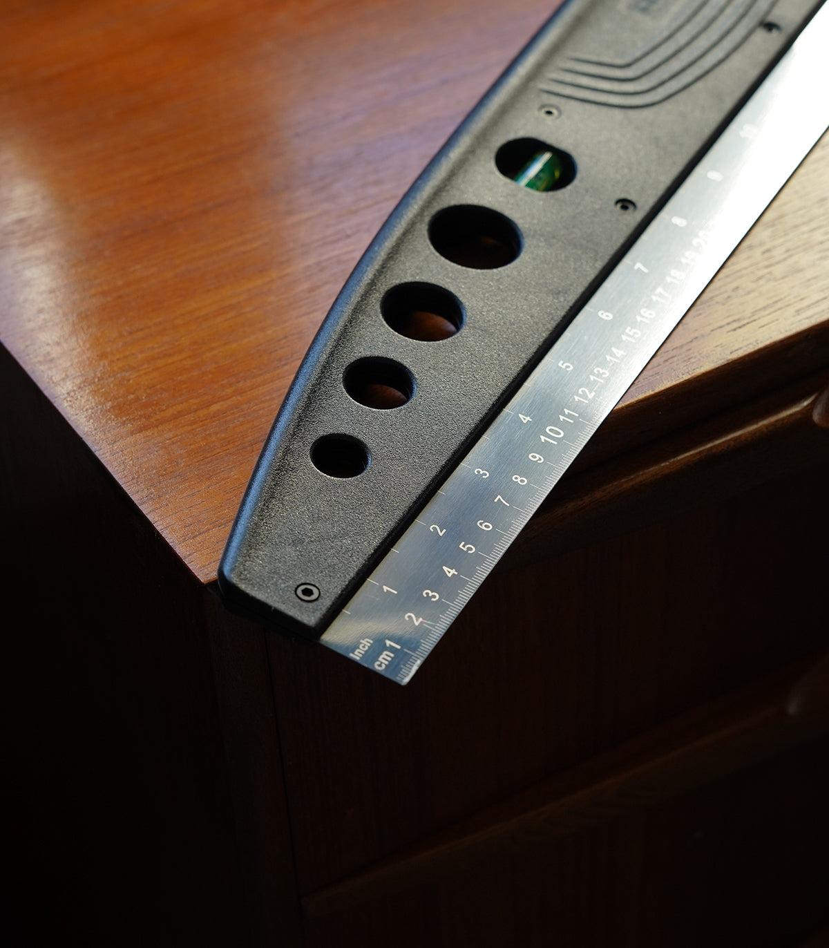 Multifunctional wallpaper strip with spirit level